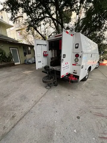 Magnet Plumbing service vehicle on-site for Grease Trap Cleaning in Colville